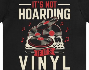 May include: Black t-shirt with a vintage-style illustration of a record player and the text "It's not hoarding if it's vinyl."