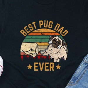 May include: Black t-shirt with a vintage-style graphic of a pug with the text "Best Pug Dad Ever".