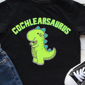 May include: Black t-shirt with a green dinosaur and the text "Cochlearosaurus" in white.