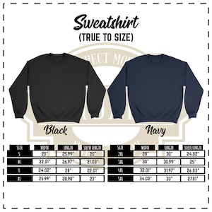 May include: Size chart for a black and navy blue sweatshirt. The chart shows the width, length, and sleeve length in inches for sizes S through 5XL.