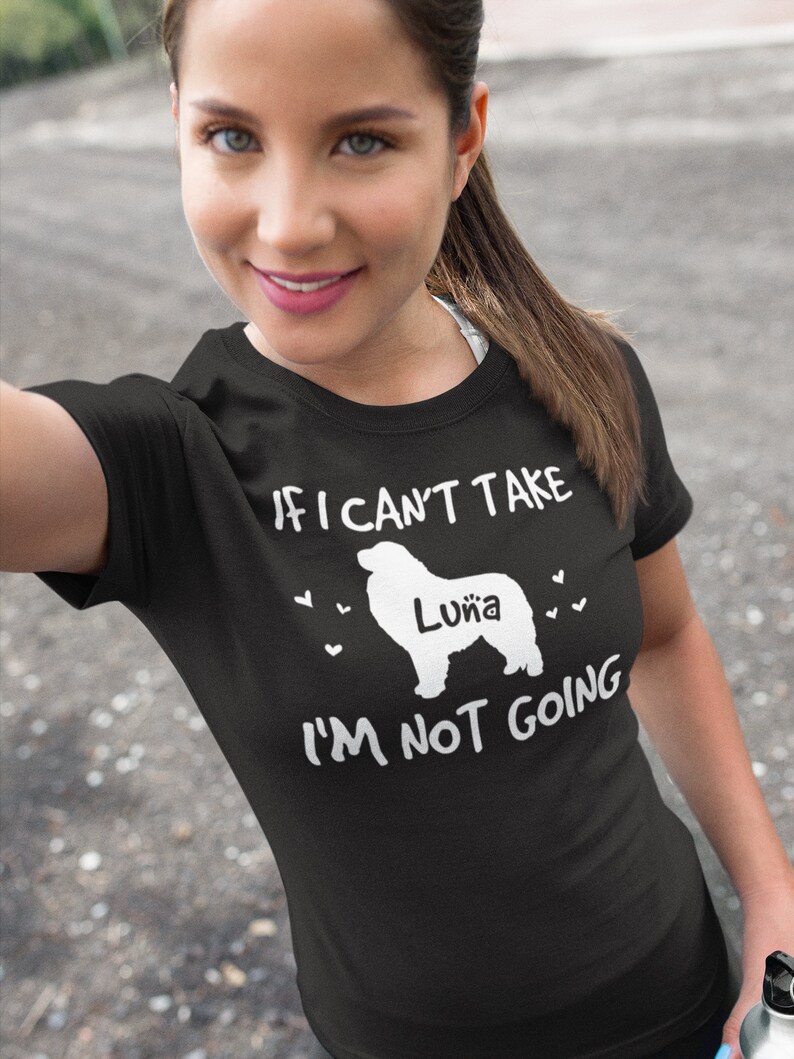 May include: Black t-shirt with white text that reads "If I can't take Luna I'm not going". The text is accompanied by a white silhouette of a dog with the name "Luna" written on it.
