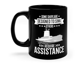 May include: Black ceramic coffee mug with a white graphic of a submarine and the text "Some ships are designed to sink. Others require assistance."