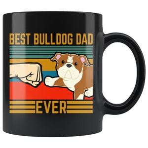 May include: Black coffee mug with a retro design featuring a bulldog and the text "Best Bulldog Dad Ever".