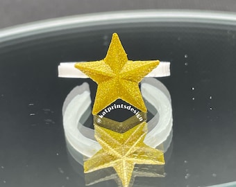 Anillos de muestra de esmalte de uñas con estrella impresa en 3D de 10 quilates