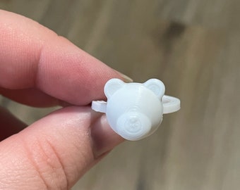 Anillos de muestra de esmalte de uñas con cabeza de osito de peluche impresa en 3D de 10 quilates