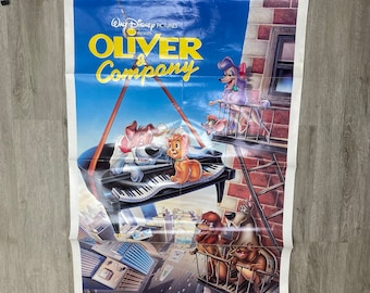 May include: A vintage movie poster for the Disney film "Oliver & Company". The poster features a colorful illustration of the main characters, including Oliver the kitten, Dodger the dog, and a group of other animals, all set against a backdrop of the New York City skyline.