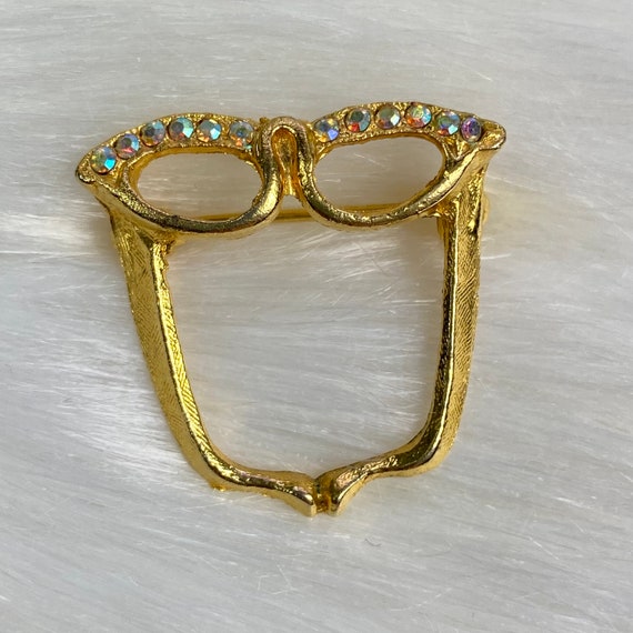 Vintage Gold Tone Rhinestone Cat Eye Glasses Broo… - image 1
