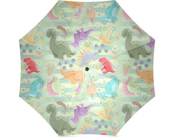 DINOSAURS! Umbrella - A hoard of kawaii designs on a rain umbrella or sun parasol including all of your favorite dinosaurs like t-rex