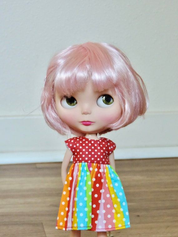Pink guinness wig red dot