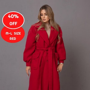 May include: A long, red coat with a belted waist and large lapels. The coat has pockets and long sleeves. The image includes text that says "40% OFF" and "M-L SIZE RED".