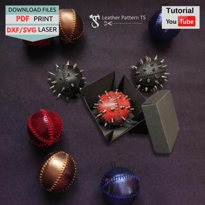 May include: A collection of spherical leather objects in red, black, bronze, and blue, some featuring metal studs and visible stitching. One red studded sphere sits inside a black geometric box. Text includes DOWNLOAD FILES PDF PRINT DXF/SVG LASER, Leather Pattern TS, and Tutorial You Tube.