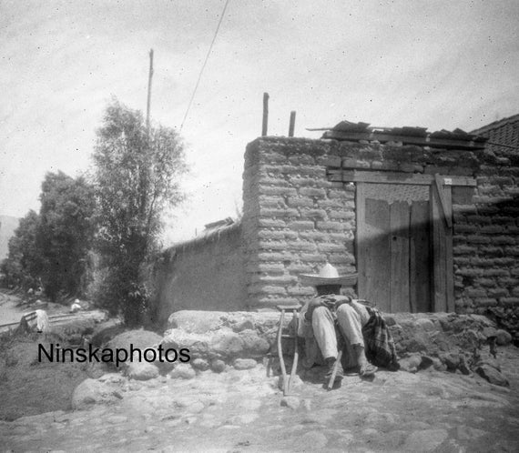 1920s Amecameca - Man sitting at Street Corner, Mexico 1920s Antique Photo reproduction, Vintage Photography Black and White