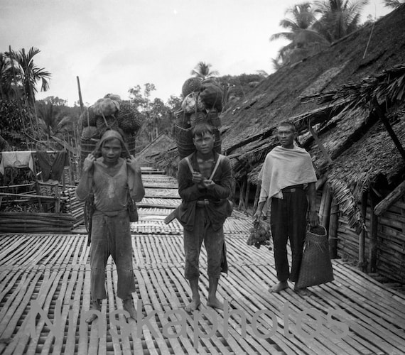 Dayak Fruit Sellers carrying Durian and Rambutan in Sarawak, Borneo, Malaysia by J. Dearden Holmes, 1920s antique photo reprint
