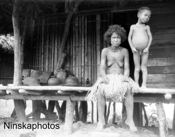 1920s Papua New Guinea - Woman and Boy in front of Hut Antique Photo Reproduction - Vintage Photography - Black and White