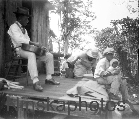 Playing Guitar on the Porch in Keaukaha, Hilo, Hawaii, United States, 1920s antique photo reprint