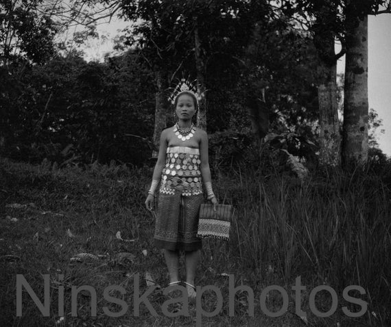 Dayak Woman in traditional dress, Kuching, Sarawak, Borneo, Malaysia by J. Dearden Holmes, 1920s antique photo reprint