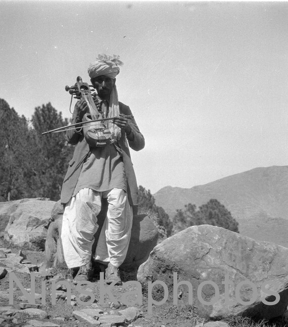 Musician on the road to Kashmir by J. Dearden Holmes, 1920s antique photo reprint, Music, Instrument, Pakistan, India, vintage photo