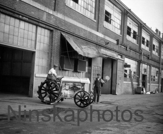 Ford Tractor going to loading dock, Ford Factory, Highland Park, Detroit, Michigan, United States, 1920s antique photo reprint