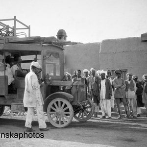 Locals and Bus along Khyber Pass - India - Pakistan - Vintage Photo Reproduction by James Dearden Holmes