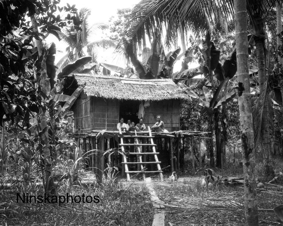 A Dayak Family in their Hut in Mengkatip, Kalimantan, Borneo, Indonesia - 1925 - Fine Art Antique Photo Print - Vintage Photo - 2982