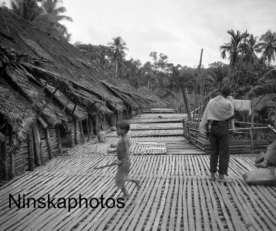Kuching, Sarawak - In a Dayak Village, Borneo, Malaysia by J. Dearden Holmes, 1920s antique photo reprint