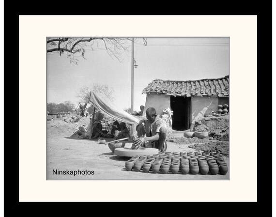 Potter at his Wheel and Pottery in Delhi, India Vintage Photo Reproduction by James Dearden Holmes - Historical Photo