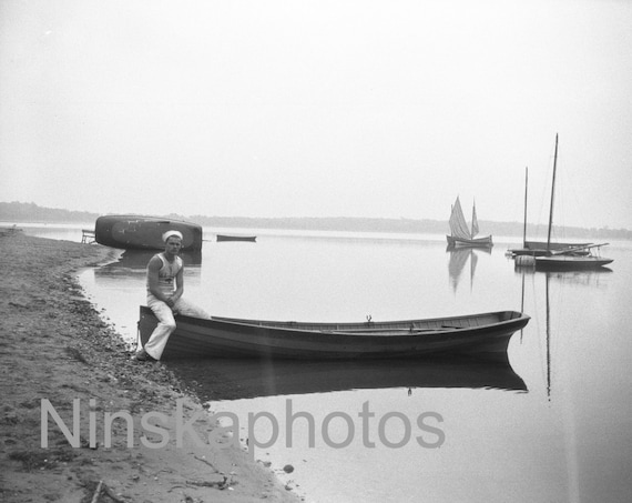 A Sailor with his boat, Lake Calhoun, Minneapolis, Minnesota, United States, 1920s antique photo reprint