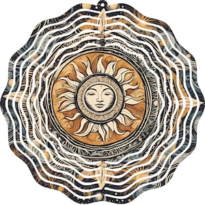 May include: A decorative sun-shaped wall hanging with a celestial design. The sun features a serene face and radiating rays in shades of gold and brown. The outer layers have a swirling pattern in black, white, and blue.
