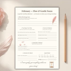 May include: A beige monthly reflection sheet titled "February - Flow & Gentle Focus" with prompts for self-reflection. The image includes a pencil, a wooden pushpin, a small hourglass, a feather, and crystals.