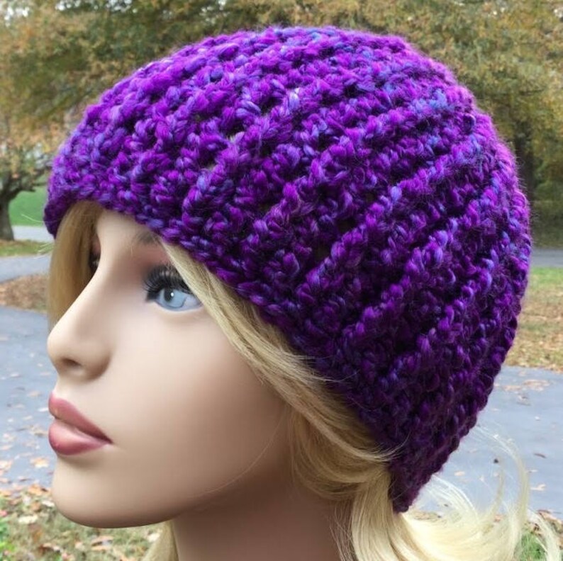 Crochet purple beanie handmade hat made with homespun yarn in color purple haze
