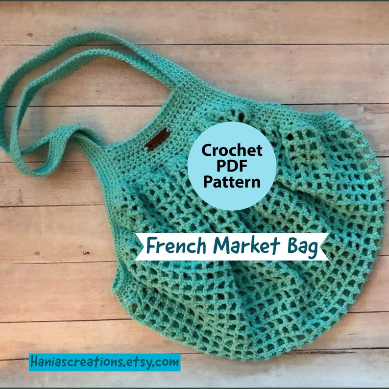 May include: A teal crochet French market bag with a brown leather tag. The bag is made with a mesh pattern and has a long strap. The text "Crochet PDF Pattern" and "French Market Bag" is visible on the image.