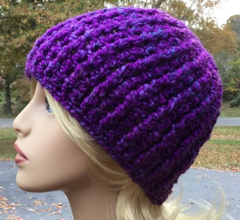 Crochet purple beanie handmade hat made with homespun yarn in color purple haze