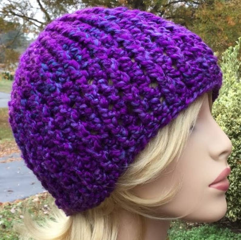 Crochet purple beanie handmade hat made with homespun yarn in color purple haze