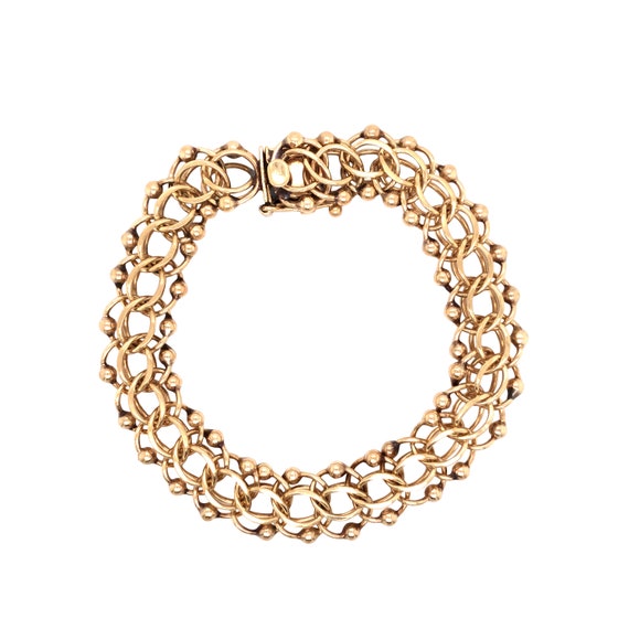 14K Yellow Gold Charm Bracelet.