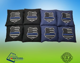 Bolsas de cornhole con escudo policial de Blue Line