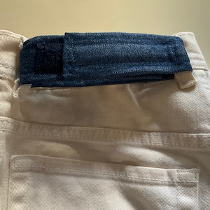 Pants waist tightener