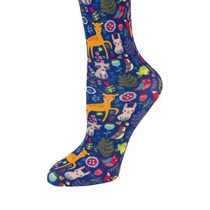 May include: A pair of blue knee-high socks with a colorful pattern of deer, rabbits, birds, and flowers.