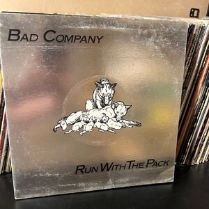 Bad Co. vintage vinyl Record- "Running With the Pack" classic rock albums, "Simple Man" "Honey Child" "Fade Away" 33 rpm 12" vinyl records