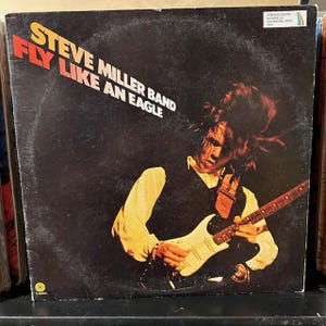 Steve Miller Band vintage vinyl record- "Fly Like an Eagle" 33 rpm vinyl album, classic rock album, "Dance, Dance, Dance" "Rock 'N Me"