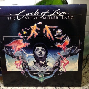 The Steve Miller Band- &quot;Circle of Love&quot;, 33 rpm 12&quot; pop rock album, 80s rock, &quot;Heart Like a Wheel&quot;, &quot;Baby Wanna Dance&quot;, &quot;Macho City&quot;