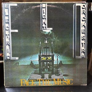 Electric Light Orchestra- &quot;Face the Music&quot; Vintage vinyl record album.  ELO, &quot;Evil Woman&quot;, &quot;Strange Magic&quot;