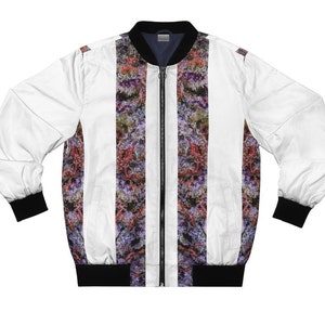 May include: White bomber jacket with a zip fastening and black ribbed trim. The jacket features a vertical striped pattern with a colourful marijuana leaf design.