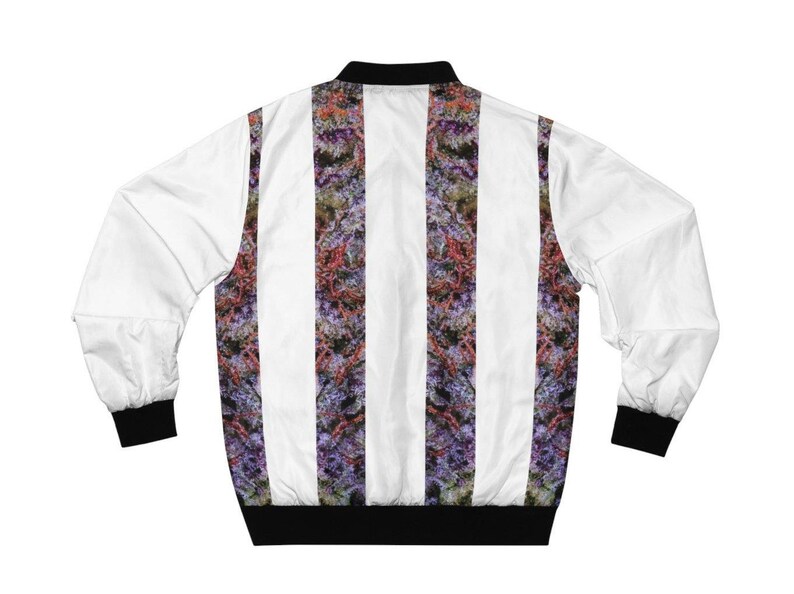 May include: A white bomber jacket with vertical stripes of a purple and green floral pattern. The jacket has a black ribbed collar, cuffs, and waistband.