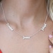 see more listings in the NECKLACE: Name, Initial section