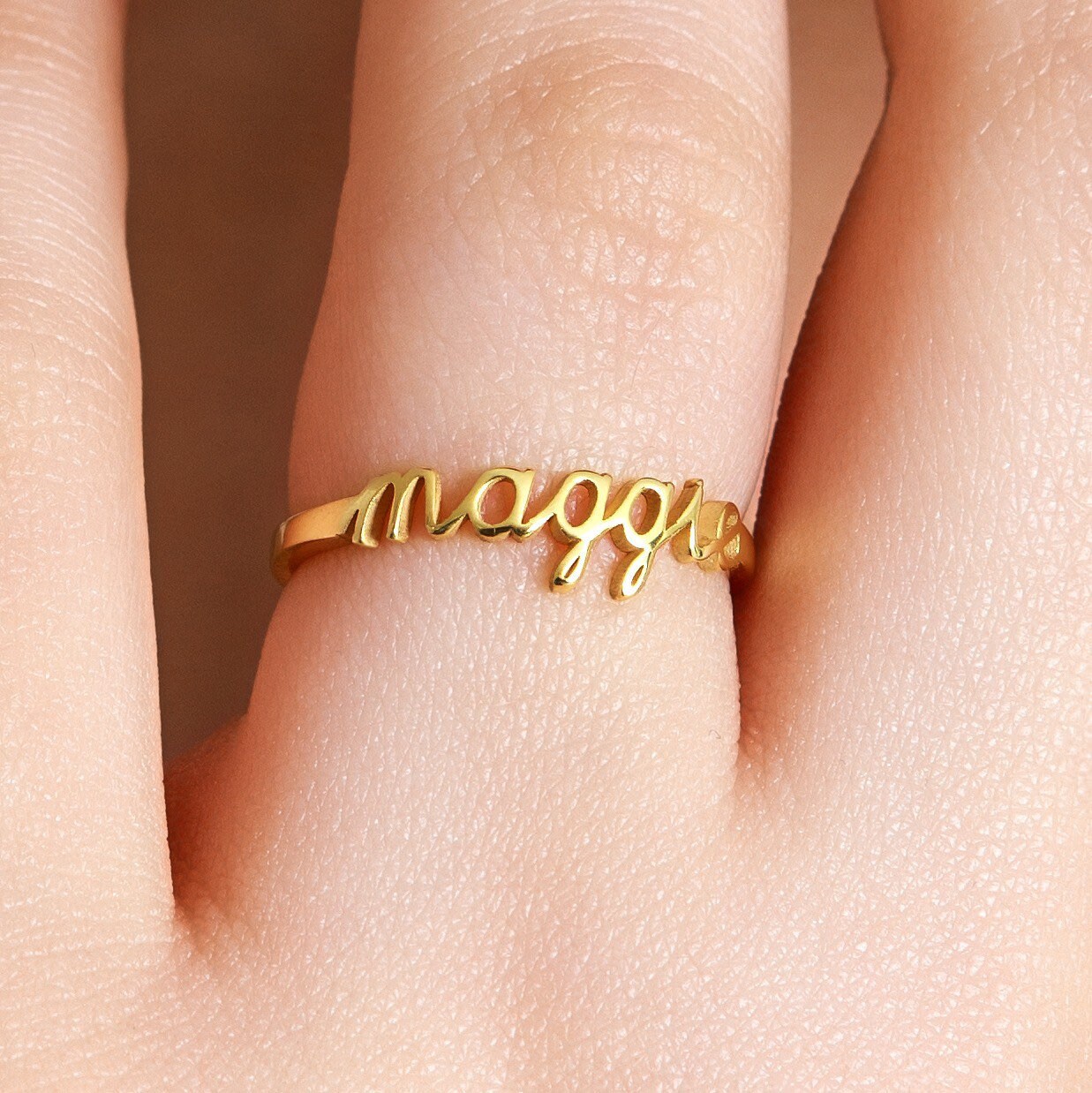 Name shop ring design