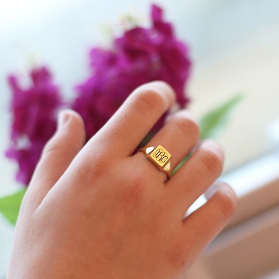 Louis Vuitton 2000s Gold Monogram Square Signet Ring · INTO