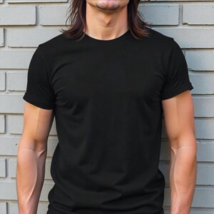 May include: A black short-sleeved t-shirt with a crew neck.