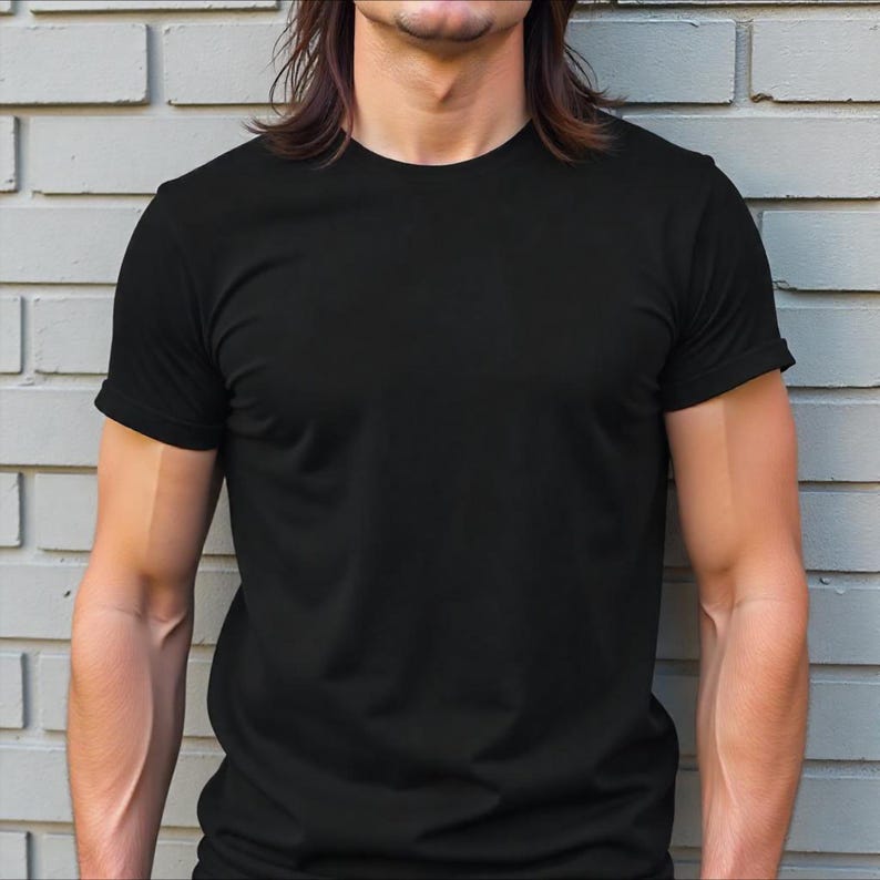 May include: A black short-sleeved t-shirt with a crew neck.