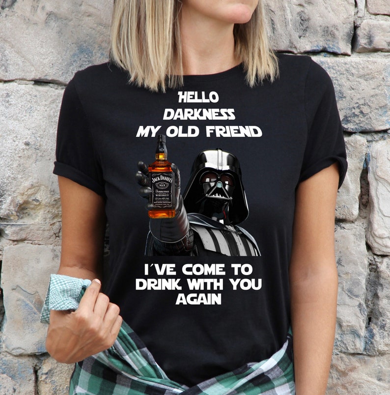 May include: Darth Vader, a Star Wars character, holds a bottle of Jack Daniel's whiskey and says "Hello darkness my old friend, I've come to drink with you again".
