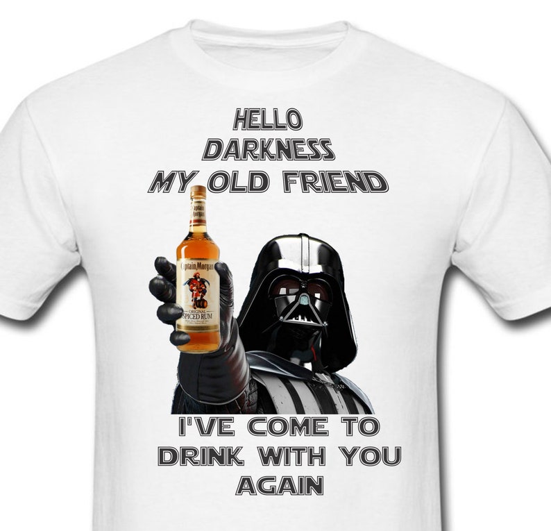 May include: A white t-shirt with a black and white image of Darth Vader holding a bottle of Captain Morgan spiced rum. The text "Hello darkness my old friend I've come to drink with you again" is printed on the shirt.
